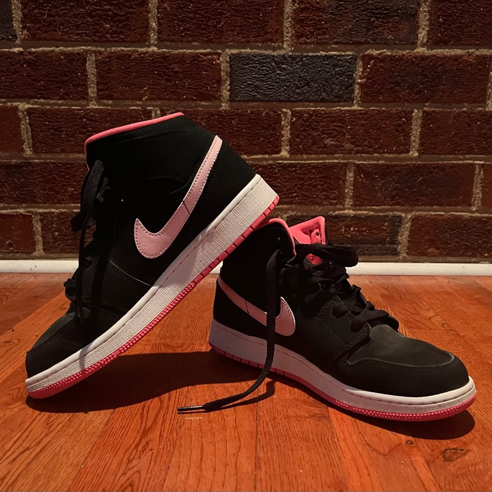 Black and pink Nike air Jordans